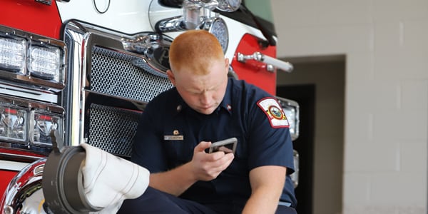 Photo of fire fighter on phone
